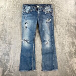 Distressed Blue Jeans